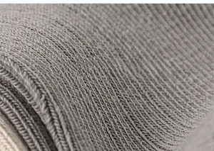 Detailed close-up showing the soft grey ribbed knit texture of children cotton socks