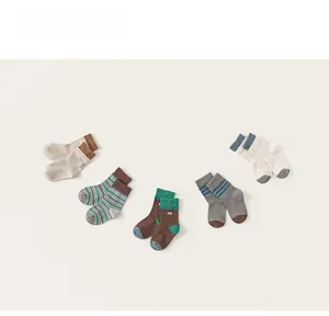Detail view of 5 pairs of children's cotton socks with vintage stripes and rib knit design