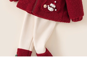 Detail of red fleece hoodie with snowman patch and matching baby jogger pants