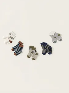 Set of 5 pairs of kids' cotton crew socks with retro striped patterns and earthy tones