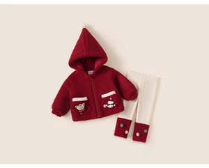 Detail of red sherpa fleece jacket with holiday teddy bear patch and matching cream pants