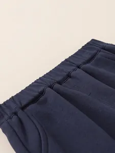 Children's dark blue thermal pants with elastic waistband and thick knit cotton fabric