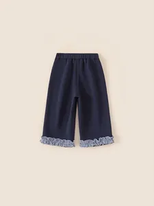 Dark blue kids casual pants featuring cute blue and white checkered ruffle leg openings
