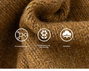 Detailed knit texture of soft brown baby cardigan showing skin-friendly fabric quality
