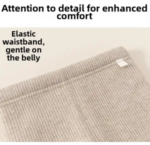 Detail of the elastic waistband on girls' ribbed thermal leggings for ultimate comfort