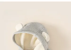 Detail of children's grey hooded jacket with fuzzy fleece lining and cute bear ears