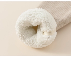 Detailed view of kids winter thermal leggings showing soft sherpa lining and ribbed texture