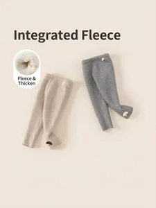 Two-pack fleece lined thermal leggings for girls in beige and dark grey with mushroom patches