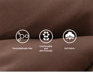 Détail du tissu matelassé marron foncé doux avec labels de qualité sans formaldéhyde