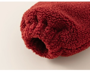 Close-up of thick wine red fleece sleeve cuff with soft texture for toddler winter set