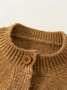 Brown knitted kids cardigan sweater with ribbed collar and color-matched button detail