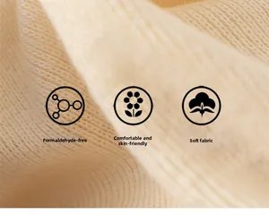 Close-up of soft beige knit fabric featuring skin-friendly and formaldehyde-free texture