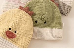 Detailed knit texture of toddler winter earflap hats with cute cartoon animal designs