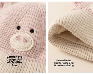 Detail of baby knit hat with cartoon pig embroidery and soft elastic ribbed brim