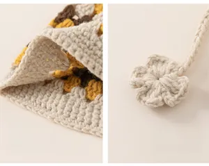 Detail of hand-crocheted hollow-out knit hat with beige floral decor and soft texture