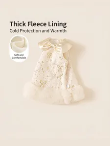 Elegant cream girls party dress with gold bow prints and tiered white mesh skirt