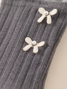 Leggings en tricot gris pour filles avec nœuds blancs et détails en perles douces