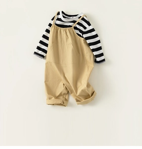 Detail of khaki overalls and striped long-sleeve T-shirt set for toddler boys