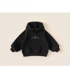 Detail of black winter hooded sweatshirt for boys with INSBOBO graphic print