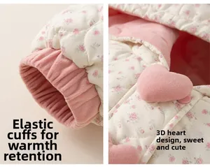 Detail of floral quilted jacket with pink elastic cuffs and cute 3D heart decoration