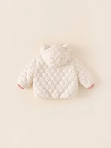 Quilted floral toddler jacket with hood ears and pink elastic cuffs on beige background