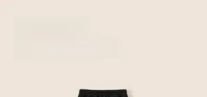 Detail of children's black velvet-lined joggers with comfortable elastic waistband