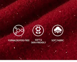 Gros plan sur le tissu en peluche rouge profond doux et texture respectueuse de la peau