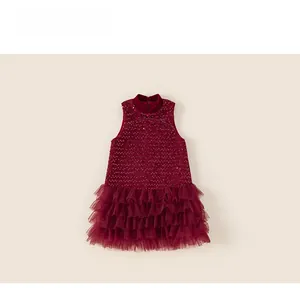 Detail of burgundy sleeveless tulle dress with shimmering sequins for girls festive wear