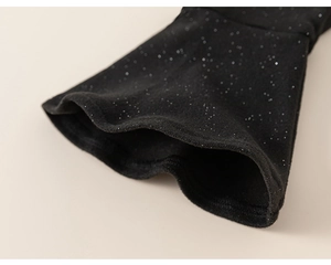 Close-up of black sequined bell sleeve cuff on children's Chinese style princess dress