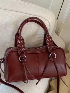 Vintage burgundy bowling handbag in Boston style with silver rings and long tassels