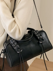 Vintage black bowling bag with lace-up tassels and silver hardware for women
