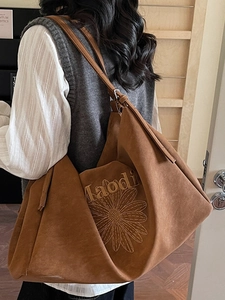 Caramel brown large capacity tote bag with daisy embroidery and shoulder strap