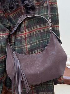 Dark brown retro hobo bag with tassel and studded strap, stylish women's shoulder bag