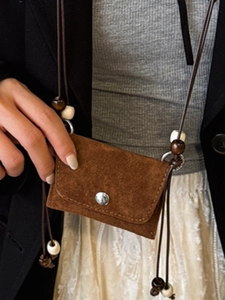 Vintage brown suede mini crossbody bag with ethnic beaded strap and silver metal clasp