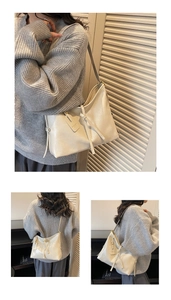 Detail of minimalist cream tote bag with soft leather texture and stylish knot design