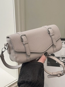 Minimalist light grey textured leather crossbody square bag with silver metal buckles