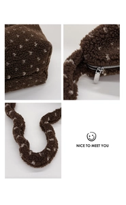 Detailed views of dark brown faux fur tote bag with white polka dots and silver zipper