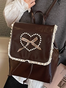 Sac à dos rétro marron en cuir avec bordure dentelle et nœud coeur perlé chic