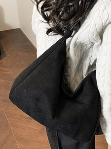 Large black suede hobo bag for women with wide shoulder strap and gold zipper