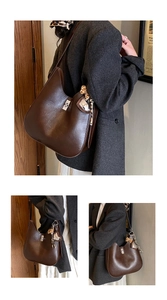 Close-up of brown PU leather tote with silver lock and leopard print scarf detail
