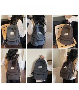 Detail shots of checkered fabric backpack with a logo patch in domestic home settings