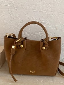 Sac Seau en Cuir PU Rétro pour Femmes Sac à Bandoulière Minimaliste Avec Boucle Magnétique Boule de Métal Nœud Cadeau
