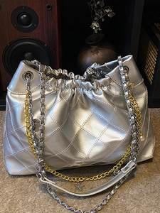Silver quilted chain shoulder bag with metallic finish and stylish star pearl pendants