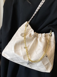Chic white quilted cloud shoulder bag with gold star charms and dual strap design