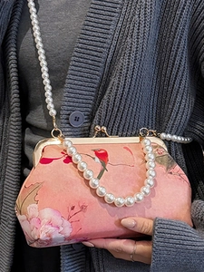 Pink Hanfu embroidery handbag with lotus patterns, pearl strap and metal kiss-lock closure