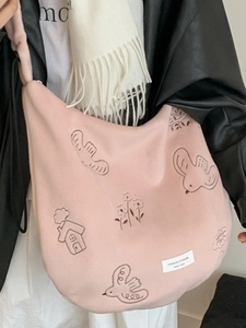 Pink canvas shoulder bag with bird and house embroidery for casual commute style