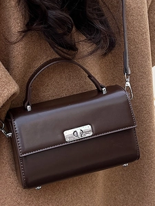 Classic dark brown square handbag with silver metal twist lock and top handle for women