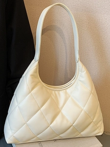 Elegant white quilted hobo shoulder bag with classic diamond stitching and wide strap
