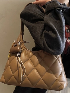 Brown quilted leather shoulder bag with diamond pattern and tassel for casual women