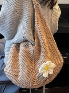 Bohemian style beige woven knit tote bag with decorative flower for casual winter fashion